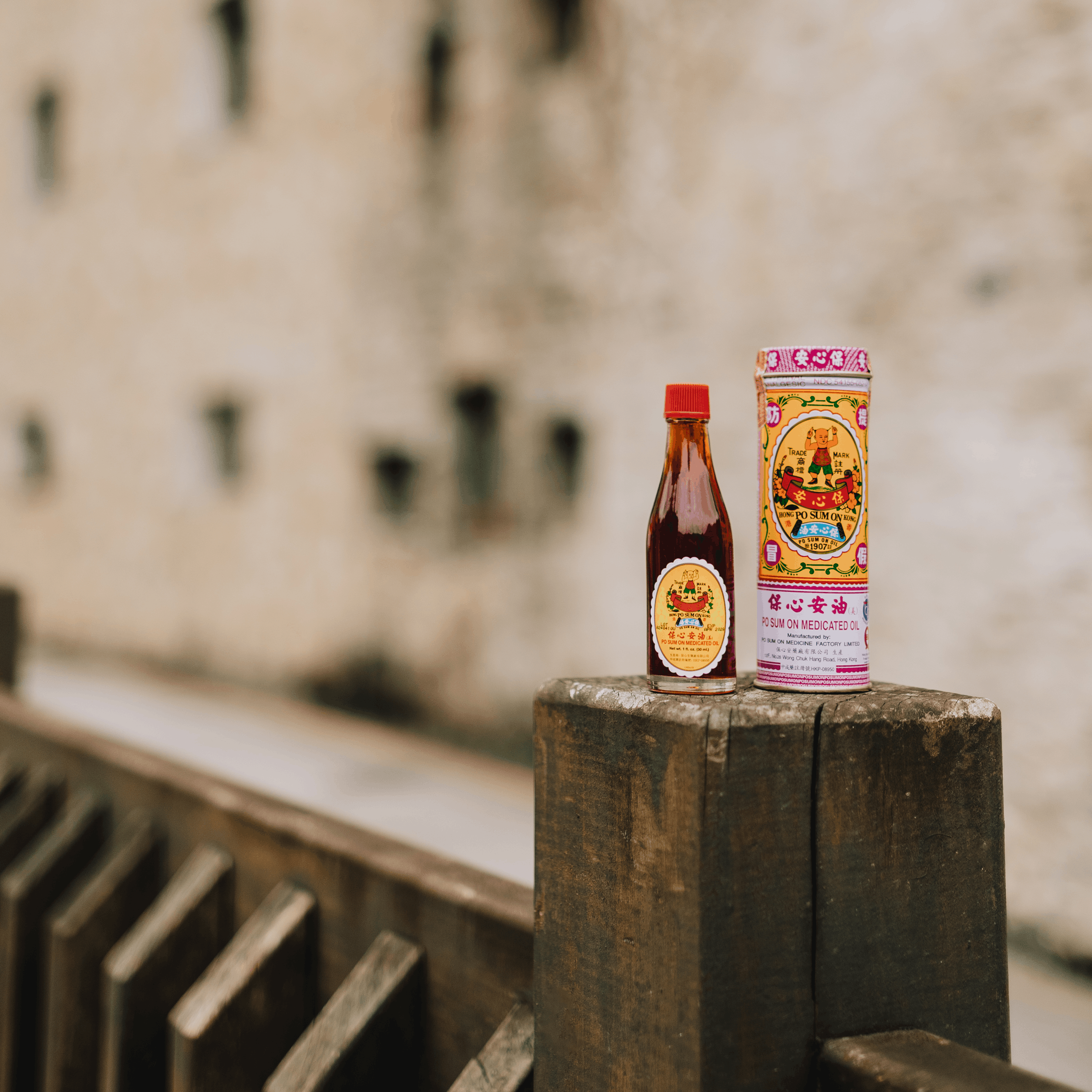 Po Sum On Oil Bottle sitting on a ledge outdoors 
